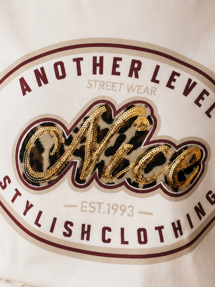 Camiseta Nice con animal print y lentejuelas 3085
